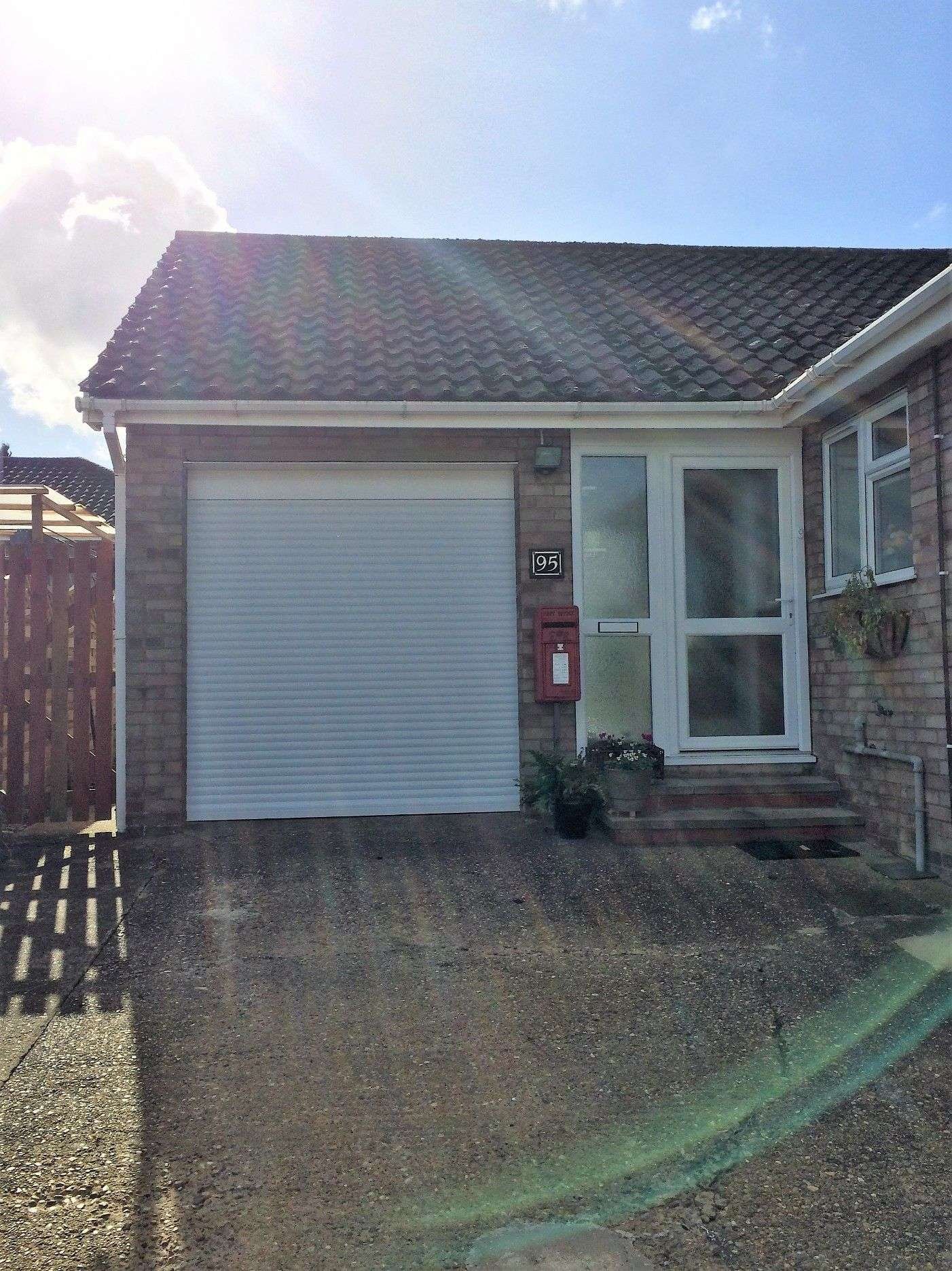 Roller garage door installation by Roofriendly