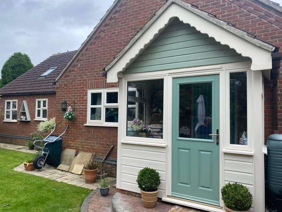 porch in lincoln with sage green cladding